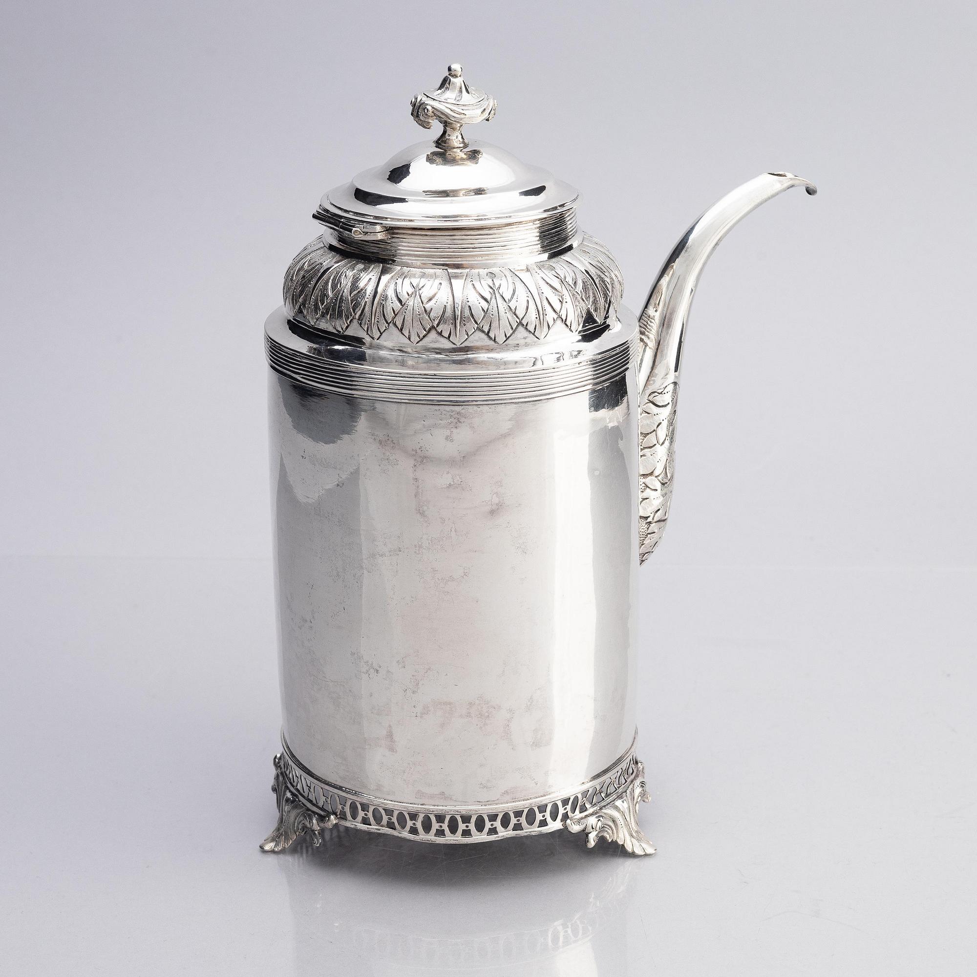 A Swedsih early 19th century silver coffe-pot, mark of Olof Hellbom, Stockholm 1809.