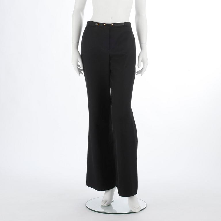 LOUIS VUITTON, a pair of black wool and silk pants.Size 40.