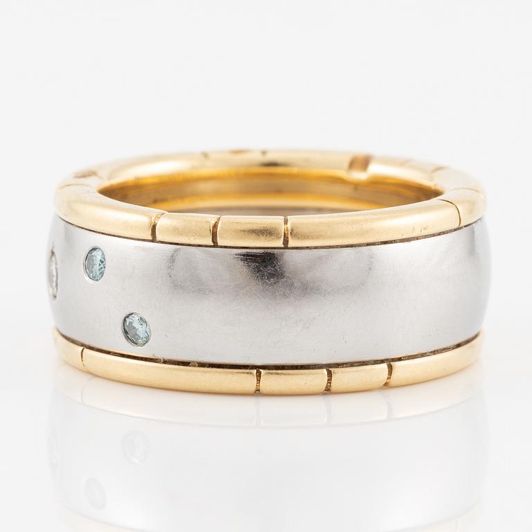 Ring 18K guld och stål med runda briljantslipade diamanter, Darsy.