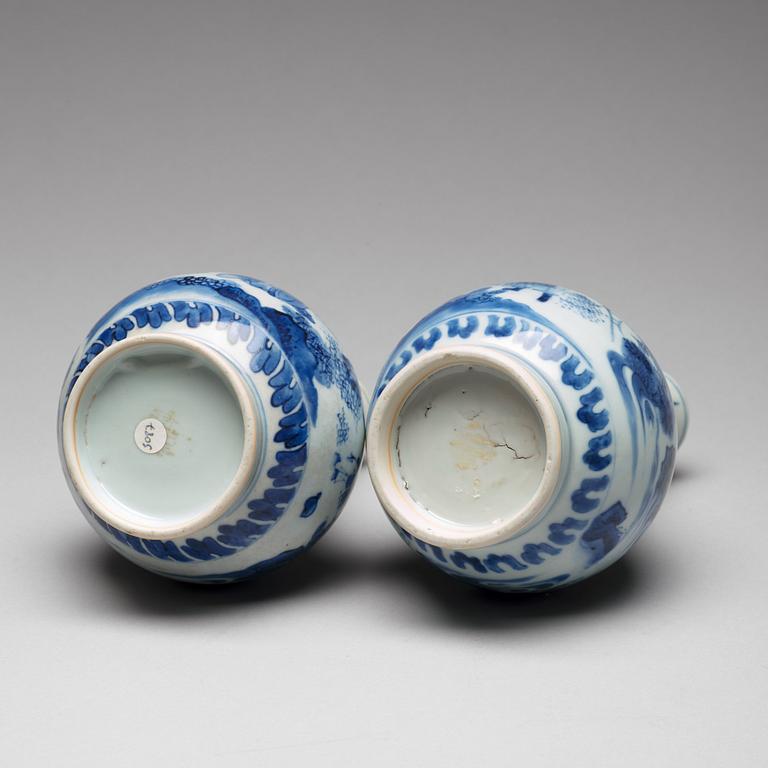 Two Transitional blue and white pear shaped vases, 17th Century.