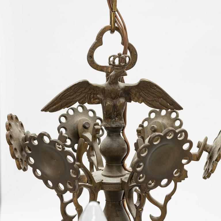A bronze Baroque style chandelier, 20th Century.