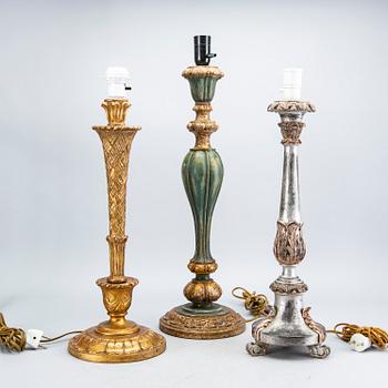 A  set of three wood table lamps from Paoletti, Firenze Italy, second half of the 20th century.
