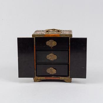 A Chinese stone and wooden cabinet, 20th century.