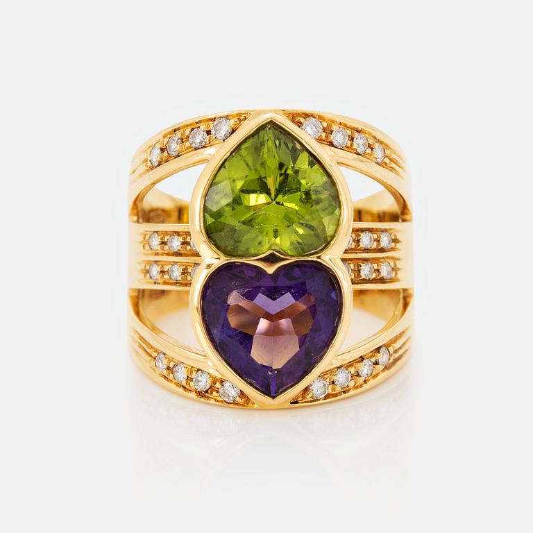 Ring 18K guld med hjärtformad och fasettslipad ametist och peridot.