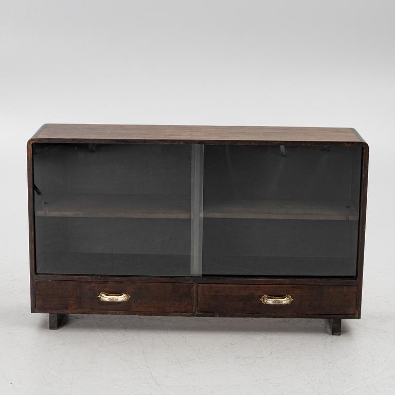 A bookcase, 1930s/1940s.