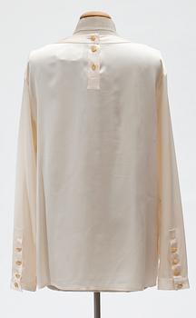 A Chanel silk blouse.