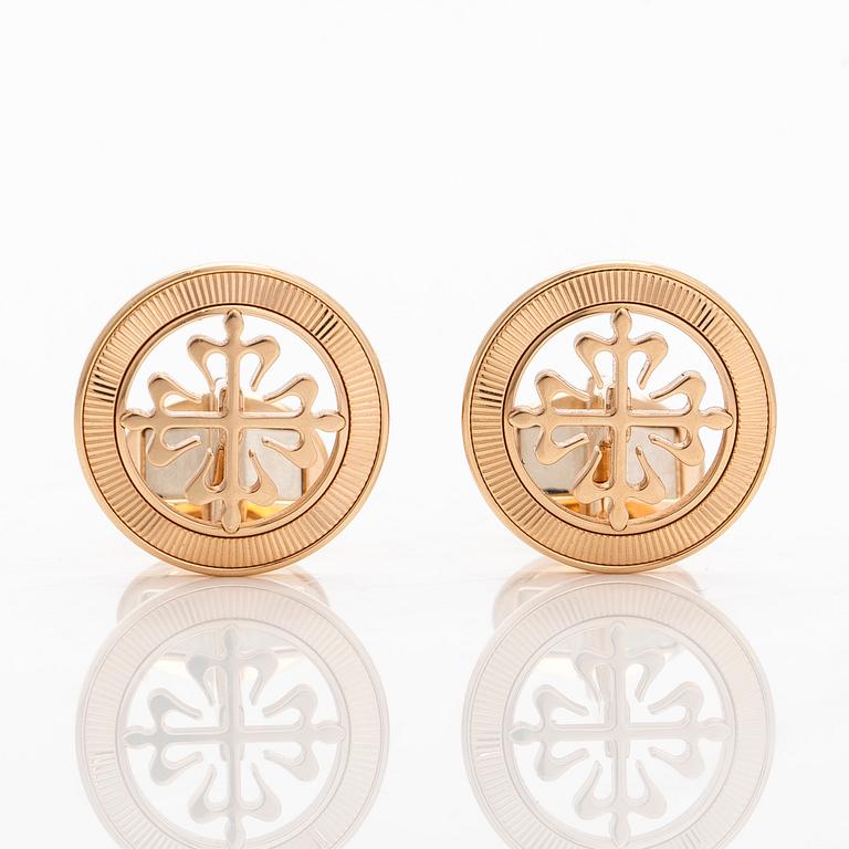 Patek Philippe, a pair of 18K gold "Calatrava" cufflinks.