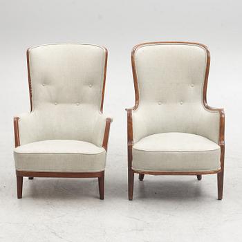 A pair of similar Swedish Modern armchairs, mid 20th century.