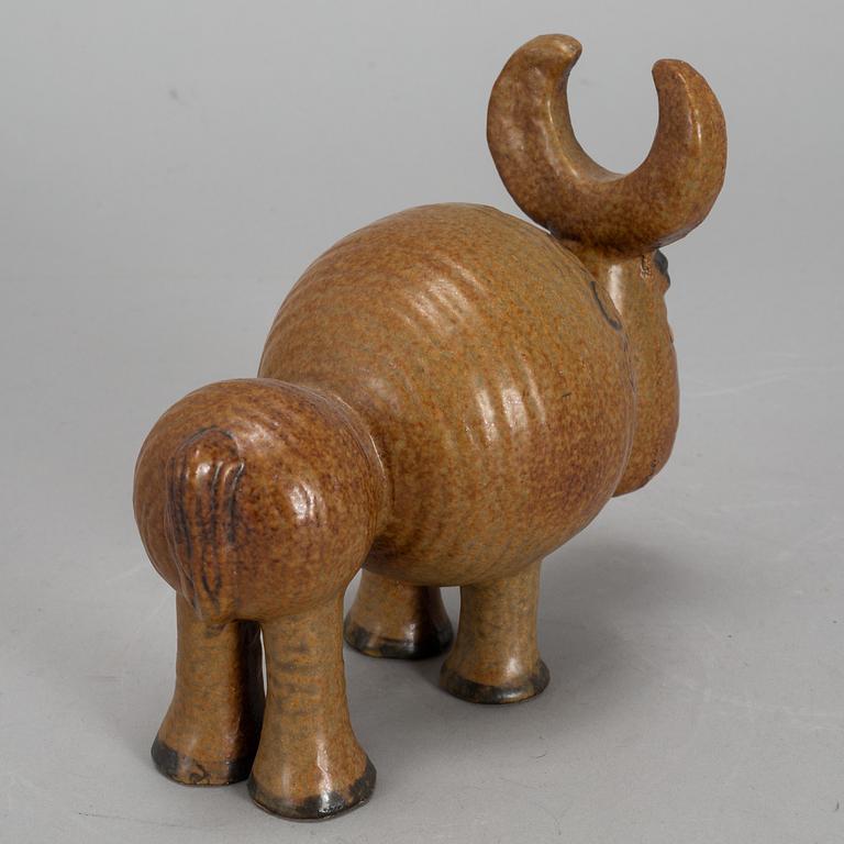 LISA LARSON, a stoneware candelabra and a figurine. Gustavsberg.