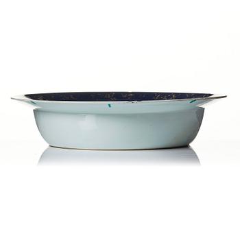 A powder blue basin and three plates, Qing dynasty, Qianlong (1736-95).