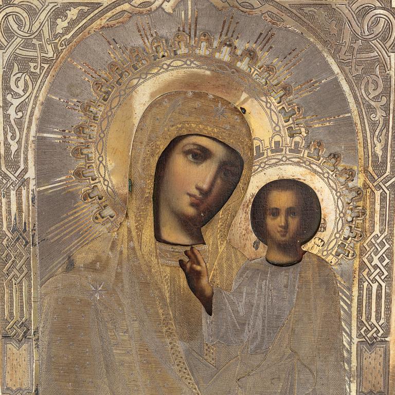 A Russian icon, with parcel-gilt oklad, Moscow, 1877.