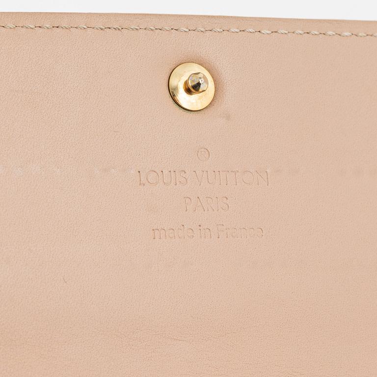 Louis Vuitton, a 'Sarah' vernis wallet.