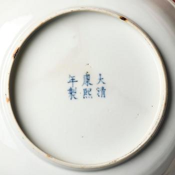 A set of four famille rose floral dishes, Qing dynasty with a apocryphal six character mark.