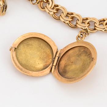 18K gold charm bracelet.