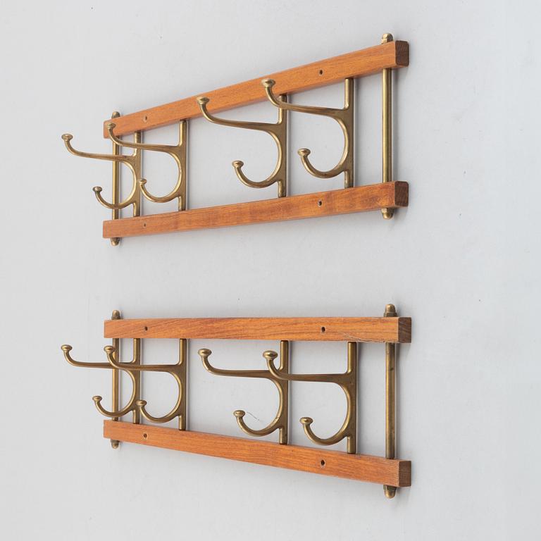 A pair of 'Dekorativ' coat hangers, Skoglunds metallgjuteri, Anderstorp, 1950's/60's.