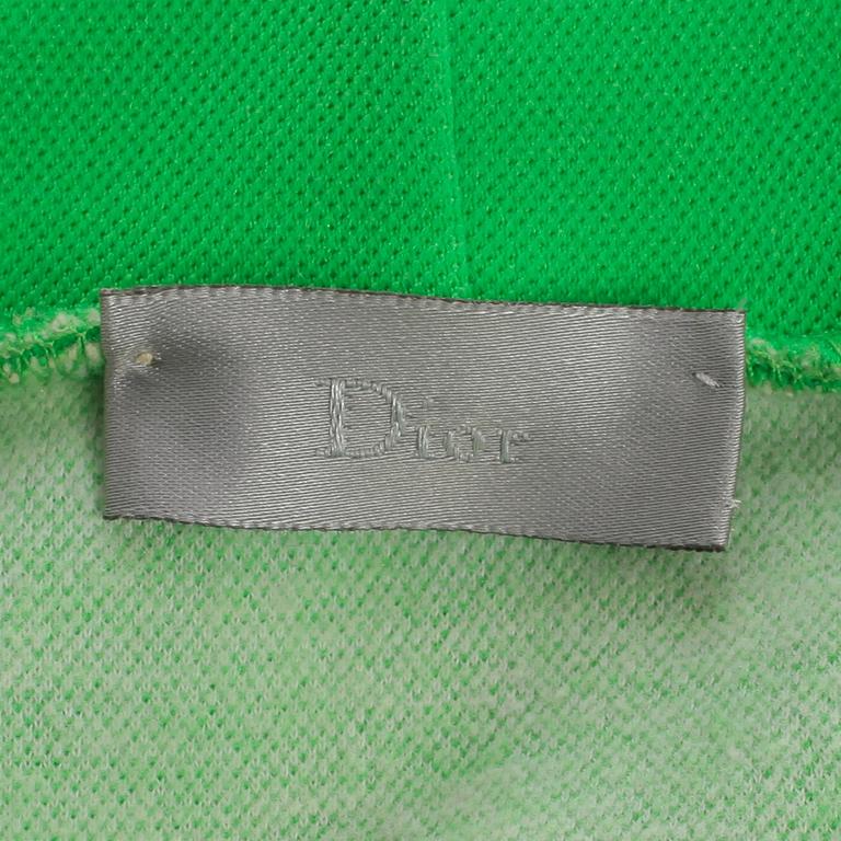 DIOR HOMME, a neon green cotton blend hoodie.