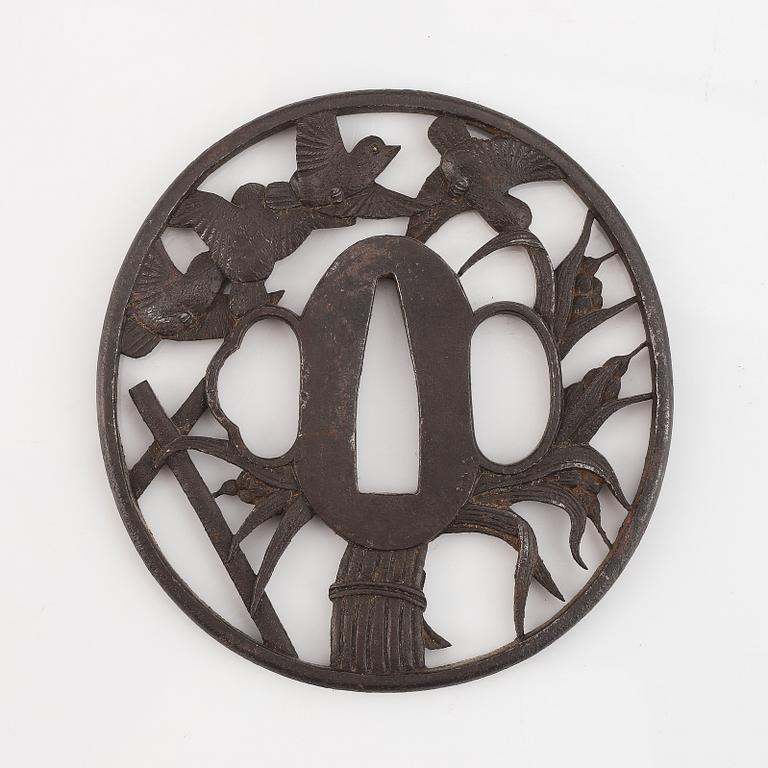 Three Japanese iron Tsubas, late Edo, one signed Kunihiro.