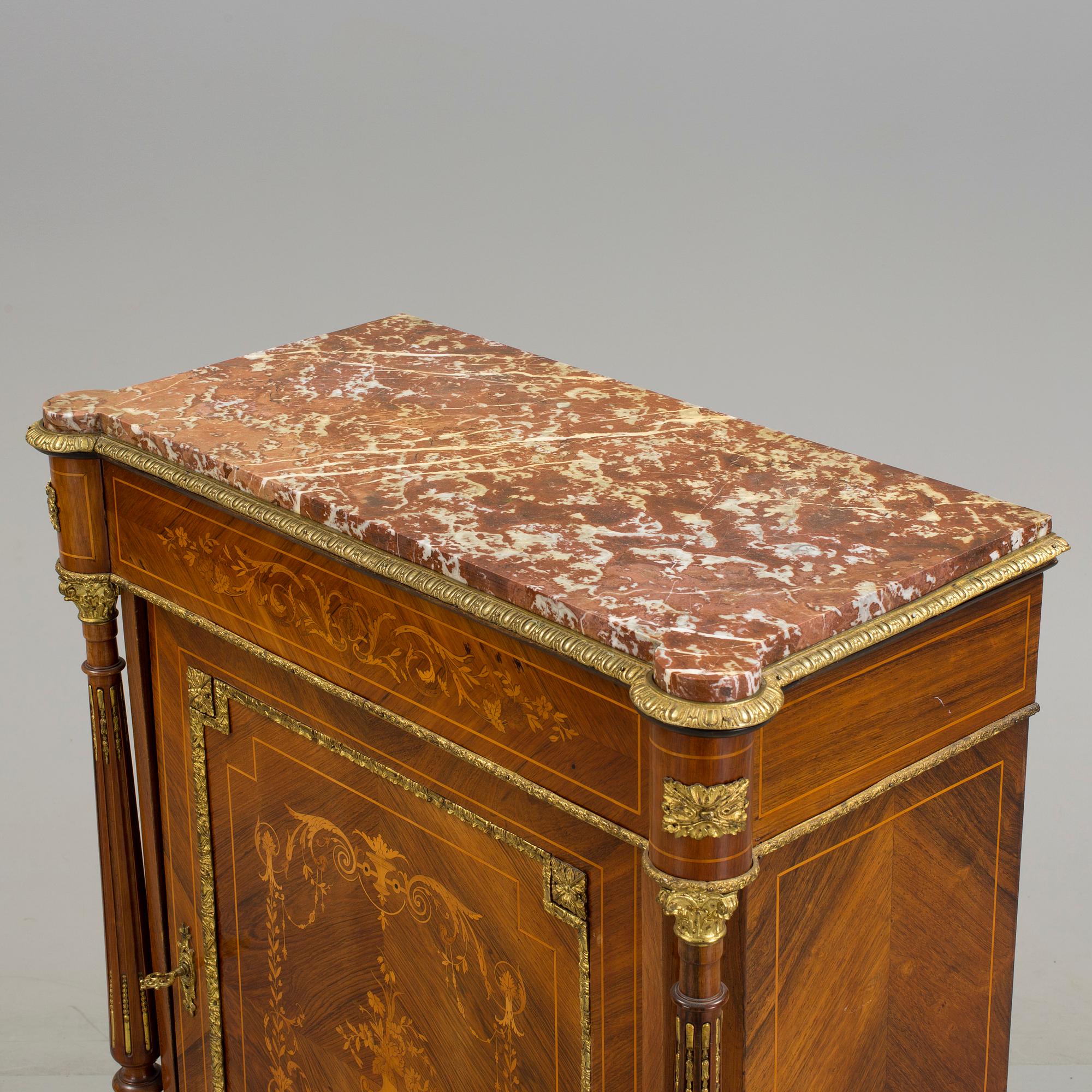 An early 20th century Louis XVI style cabinet.