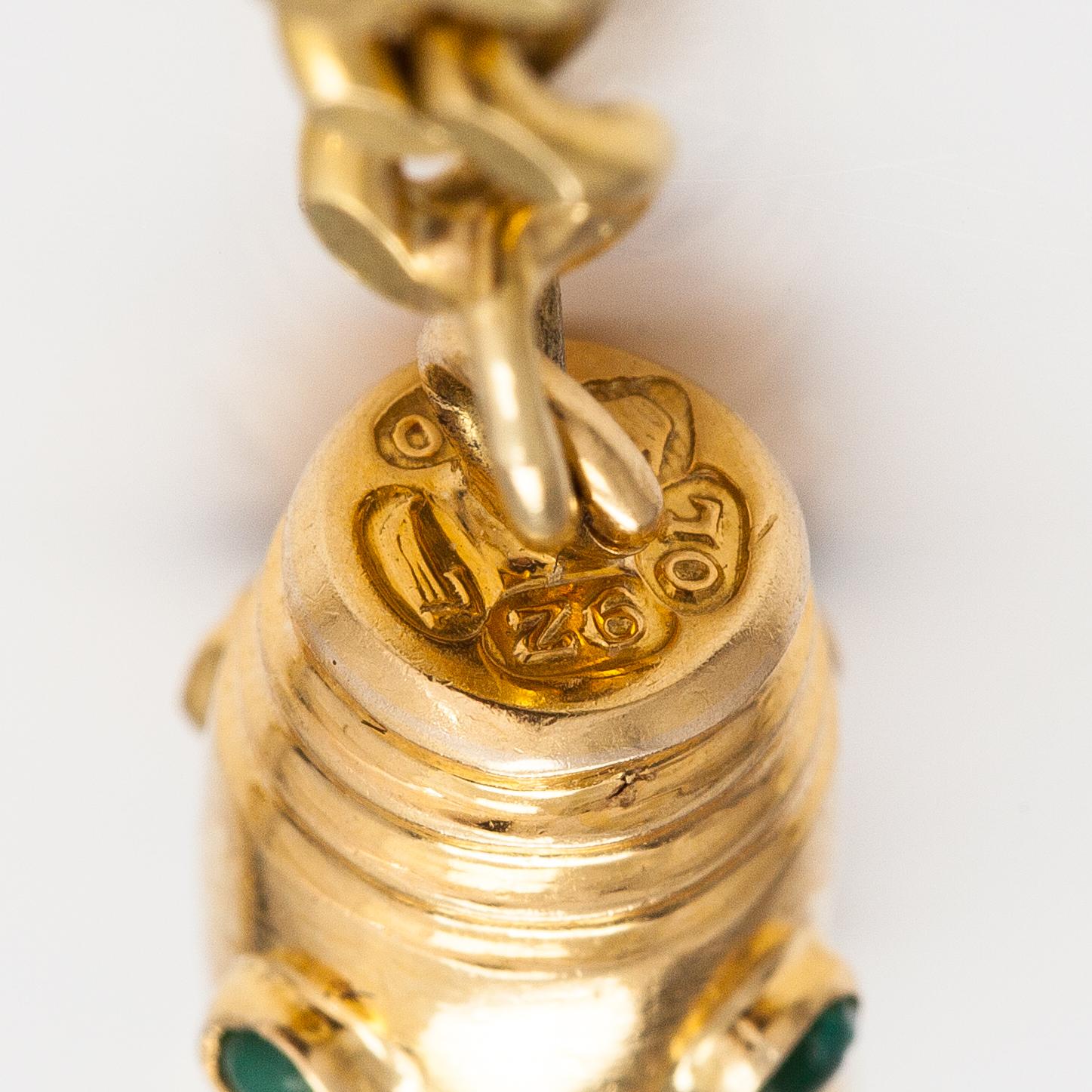 An 18K gold neckalce with stones. Erling Kaj Oy Ab, Helsinki 1977.