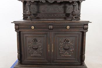 A neo-renaisssance styel cupboard first half of the 20th century.