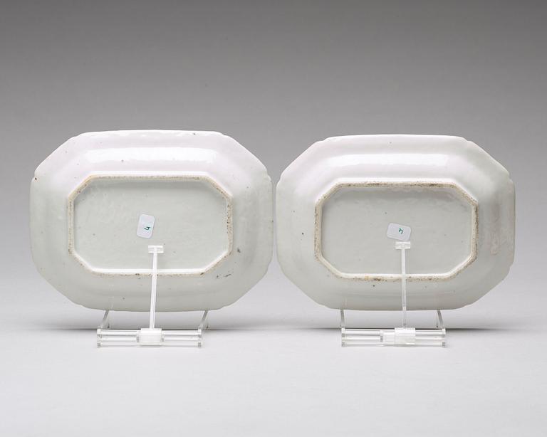 A pair of famille rose 'double peacock' butter tureens with covers and stands, Qing dynasty, Qianlong (1736-95).