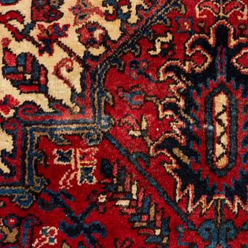 An oriental carpet, c. 330 x 285 cm.
