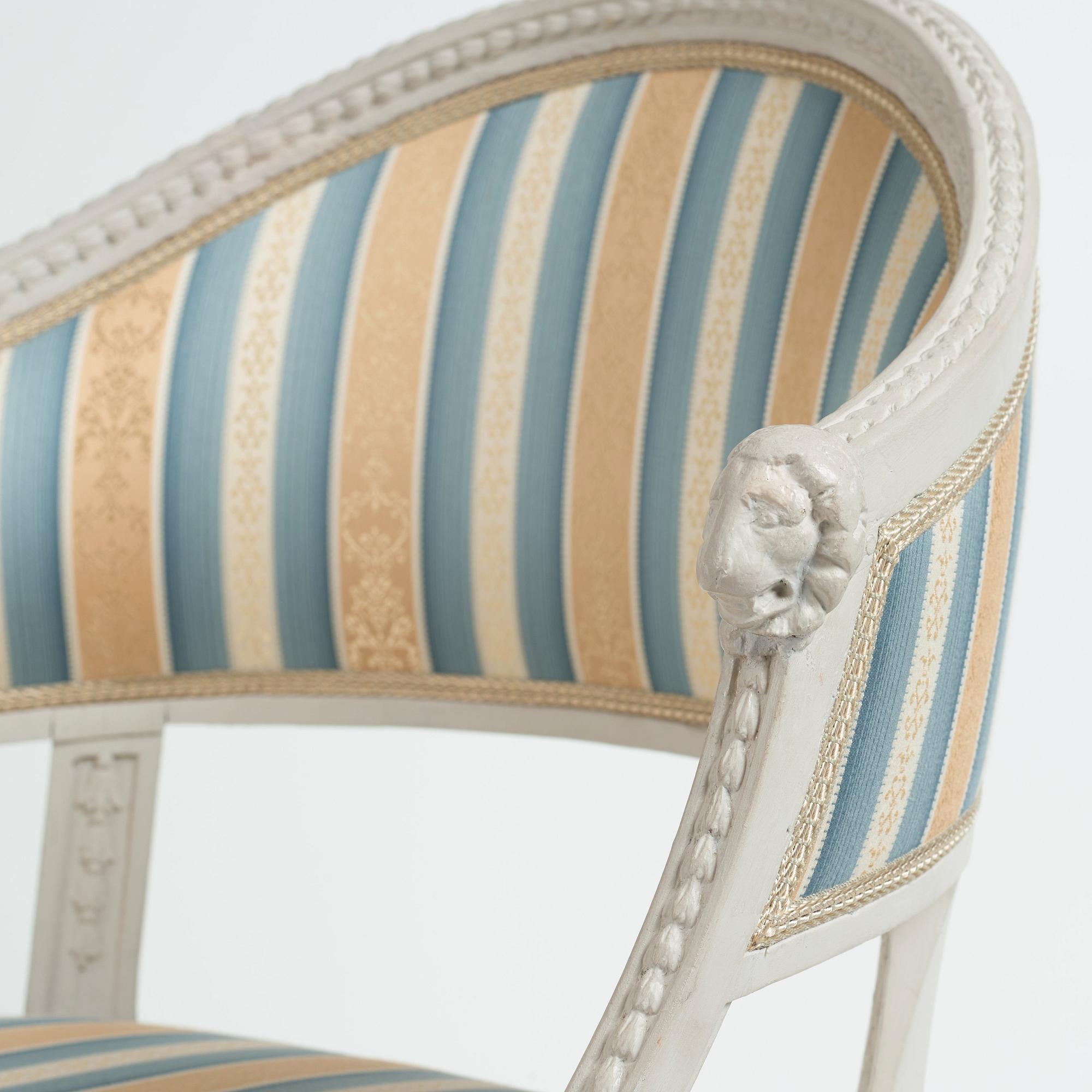 A pair of late Gustavian circa 1800 armchairs.