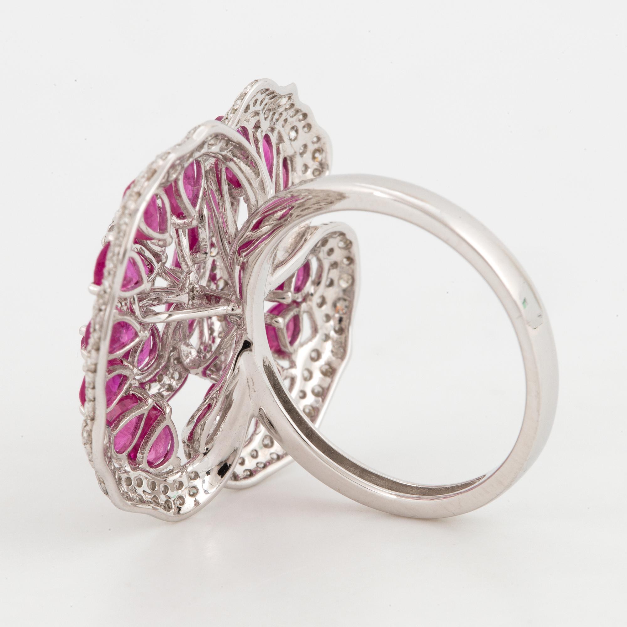 Ruby and brilliant-cut diamond flower ring.