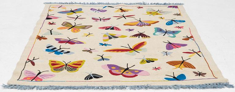 A hand-embroidered kilim carpet, c. 195 x 148 cm.