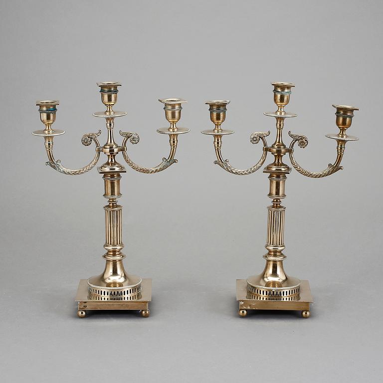 KANDELABRAR, ett par, empirestil, Gusum, omkring 1900.
