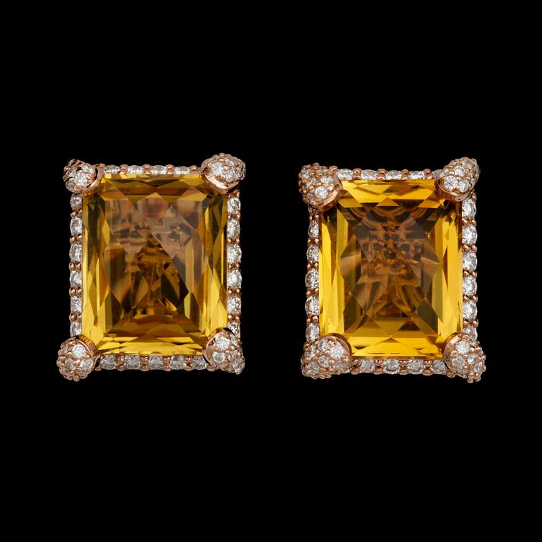 A pair of citrin and brilliant cut diamond earrings, tot. app. 2.40 cts.
