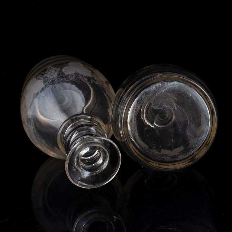 A pair of mid 19th century glass decanters and stoppers.