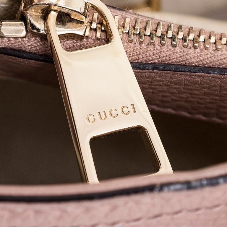 Gucci, a 'Bamboo shopper' bag.