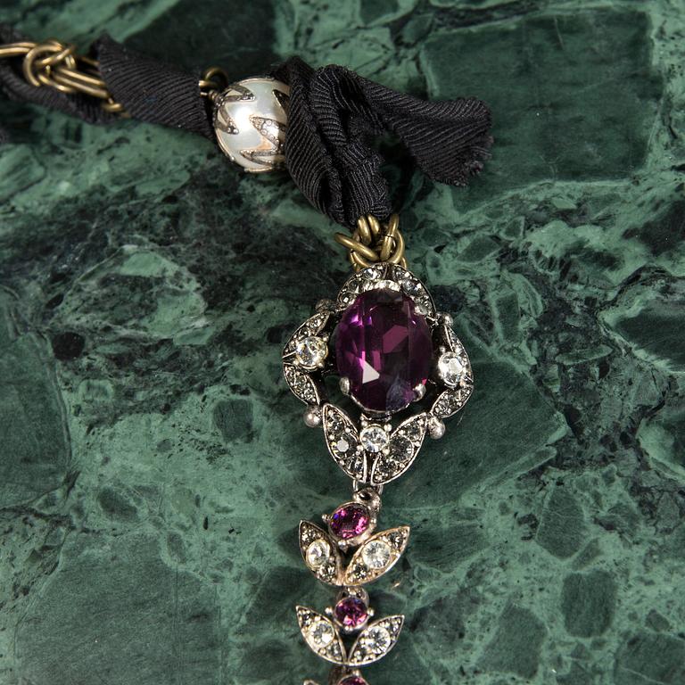 A necklace by LANVIN.