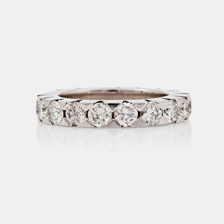An eternity ring, set with brilliant-cut diamonds. Total carat weight 3.24 cts. 18 x ca 0.18 ct.