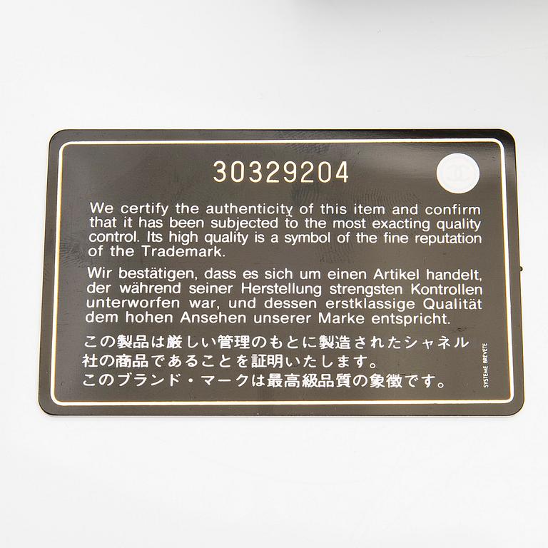 Chanel, A "19 O-coin purse" wallet.