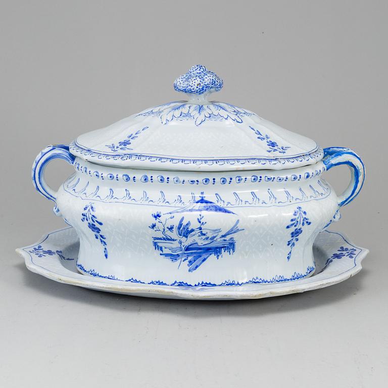 A Swedish Rörstrand faience tureen with cover and stand, 18th Century.