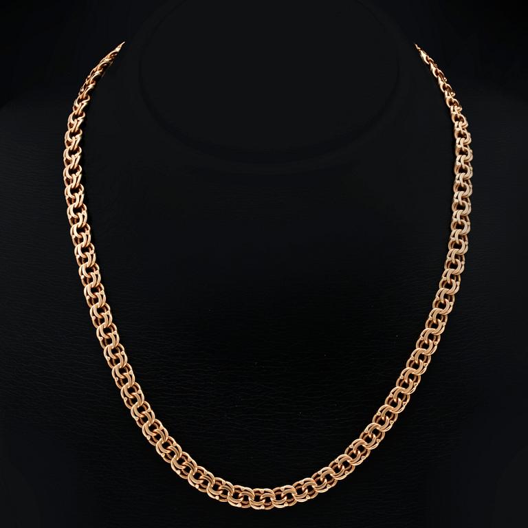 An 18K gold chain. 38g.