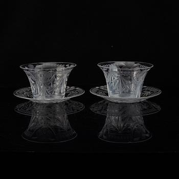 A pair of glass bowls with dishes, 20th century.