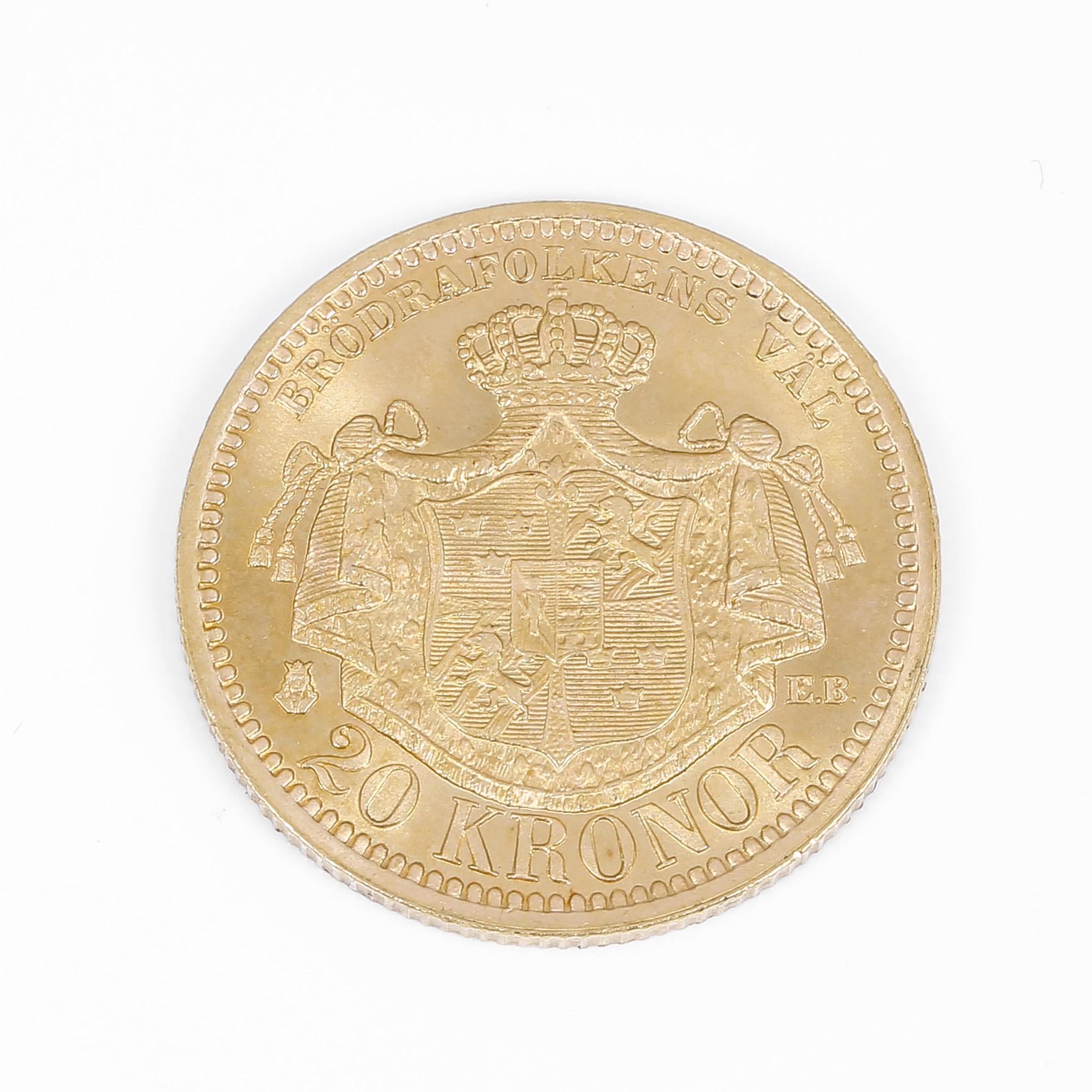 GULDMYNT, troligen omkring 20 karat. Oscar II, 20 kr. Vikt ca 8,9 gram.