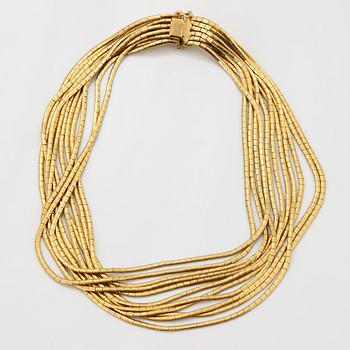 Collier 18K guld med runda briljantslipade diamanter.