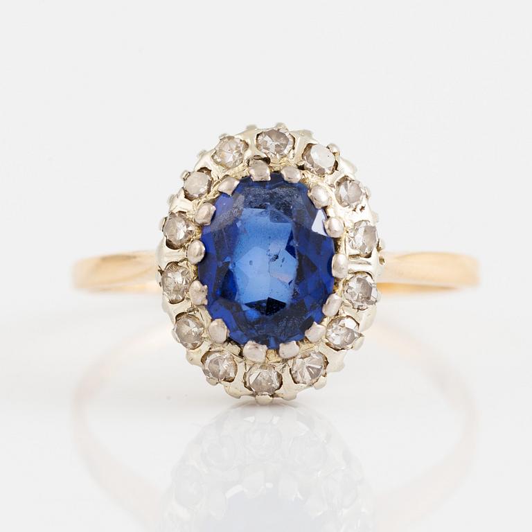 Synthetic sapphire and eight cut diamond cluster ring.