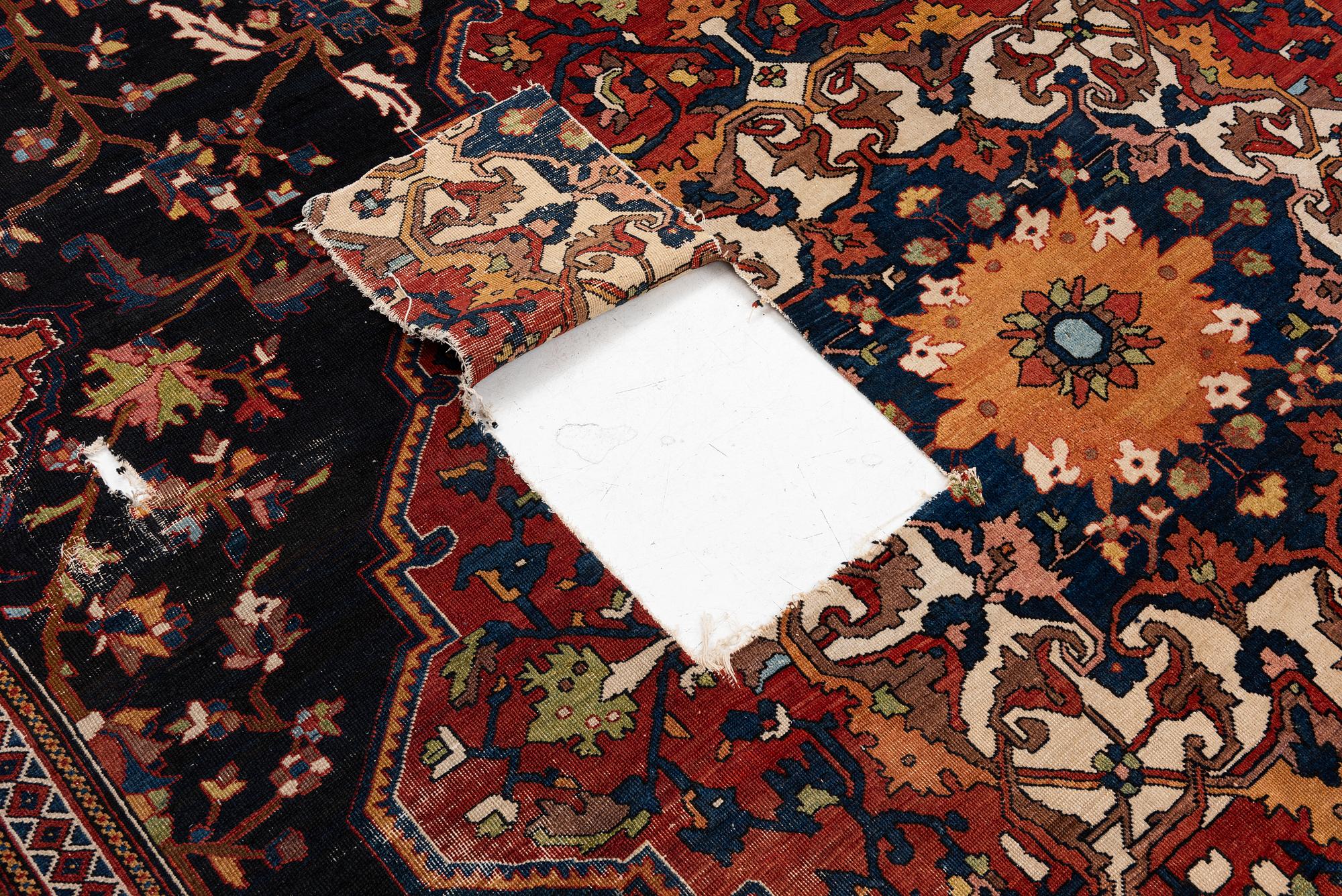 An antique 'khan carpet', Bakhtiari, western persia. c. 550 x 350 cm.