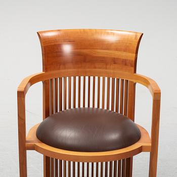 A model 606 'Barrel' chair by Frank Lloyd Wright for Cassina, designed 1937.