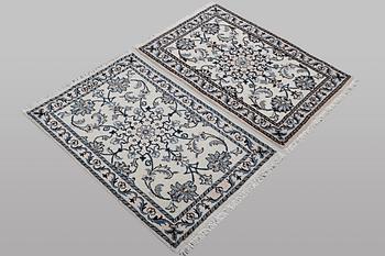 A pair of rugs, Nain, part silk, ca 90 x 60 cm & ca 90 x 60 cm.