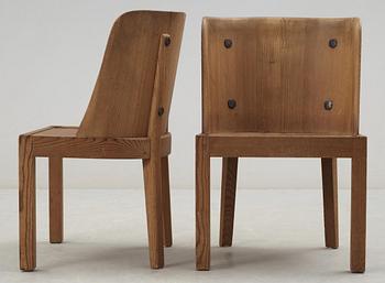 A pair of Axel-Einar Hjorth stained pine armchairs, 'Lovö', Nordiska Kompaniet, 1930's.