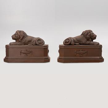 A pair of garden sculptures.