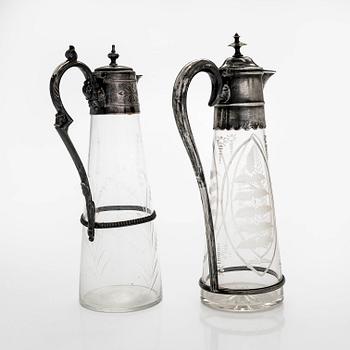 Two wine pitches, around 1900.