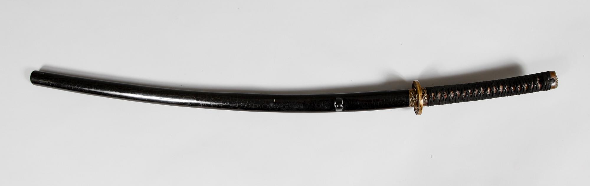 KATANA, Orientalisk, 1900-talets andra hälft. TEXTÄNDRING: Orientalisk, 1900-talets andra hälft.