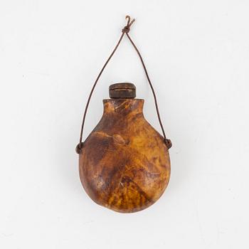 A birch salt bottle, dated 1925.